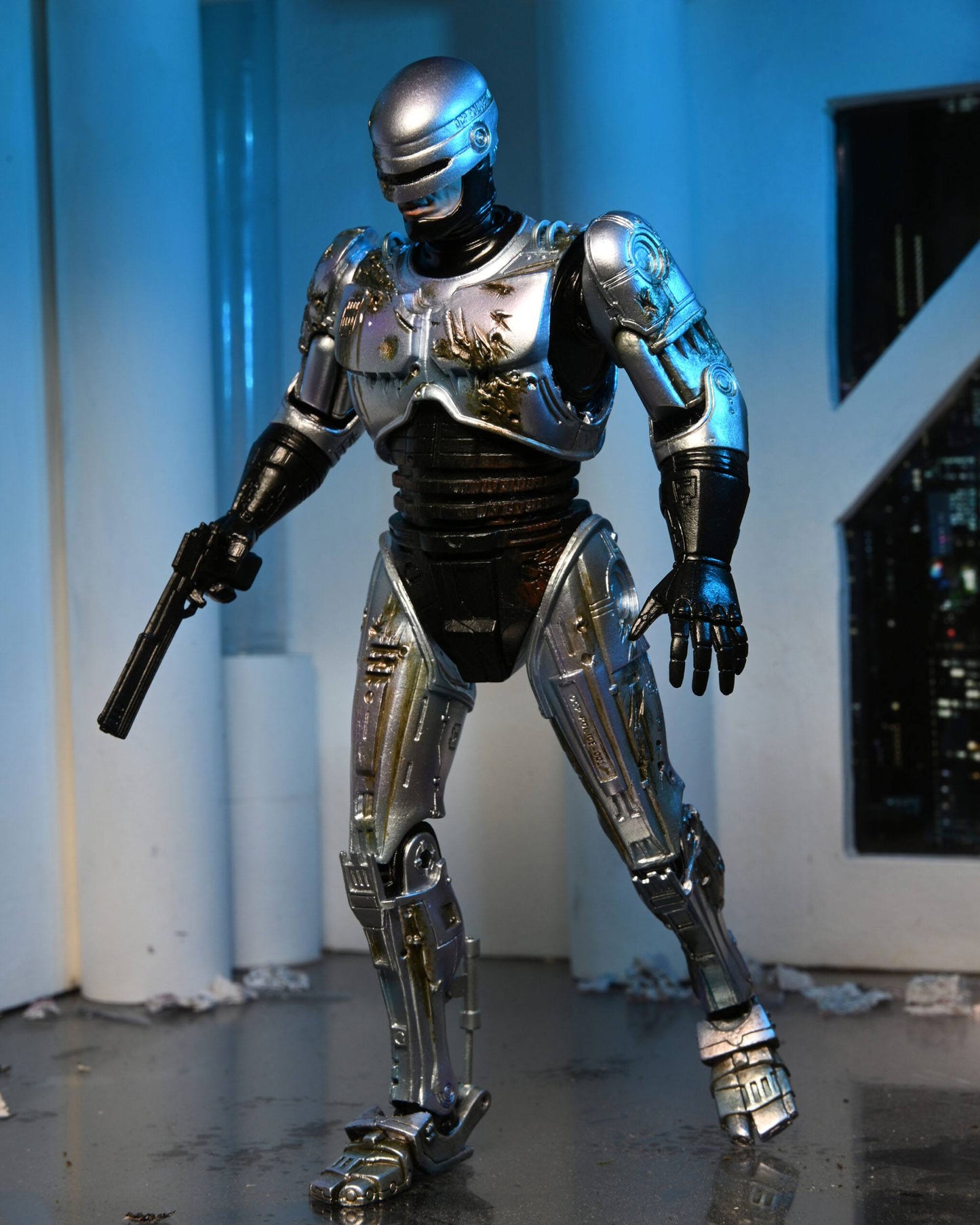 RoboCop figurine Ultimate Battle Damaged RoboCop with Chair 18 cm Neca