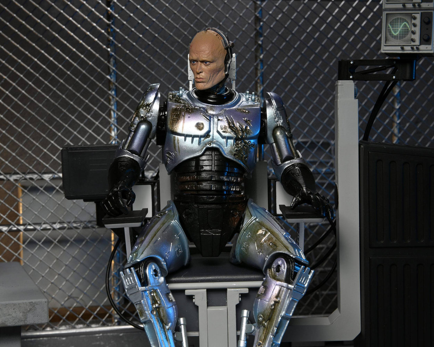 RoboCop figurine Ultimate Battle Damaged RoboCop with Chair 18 cm Neca