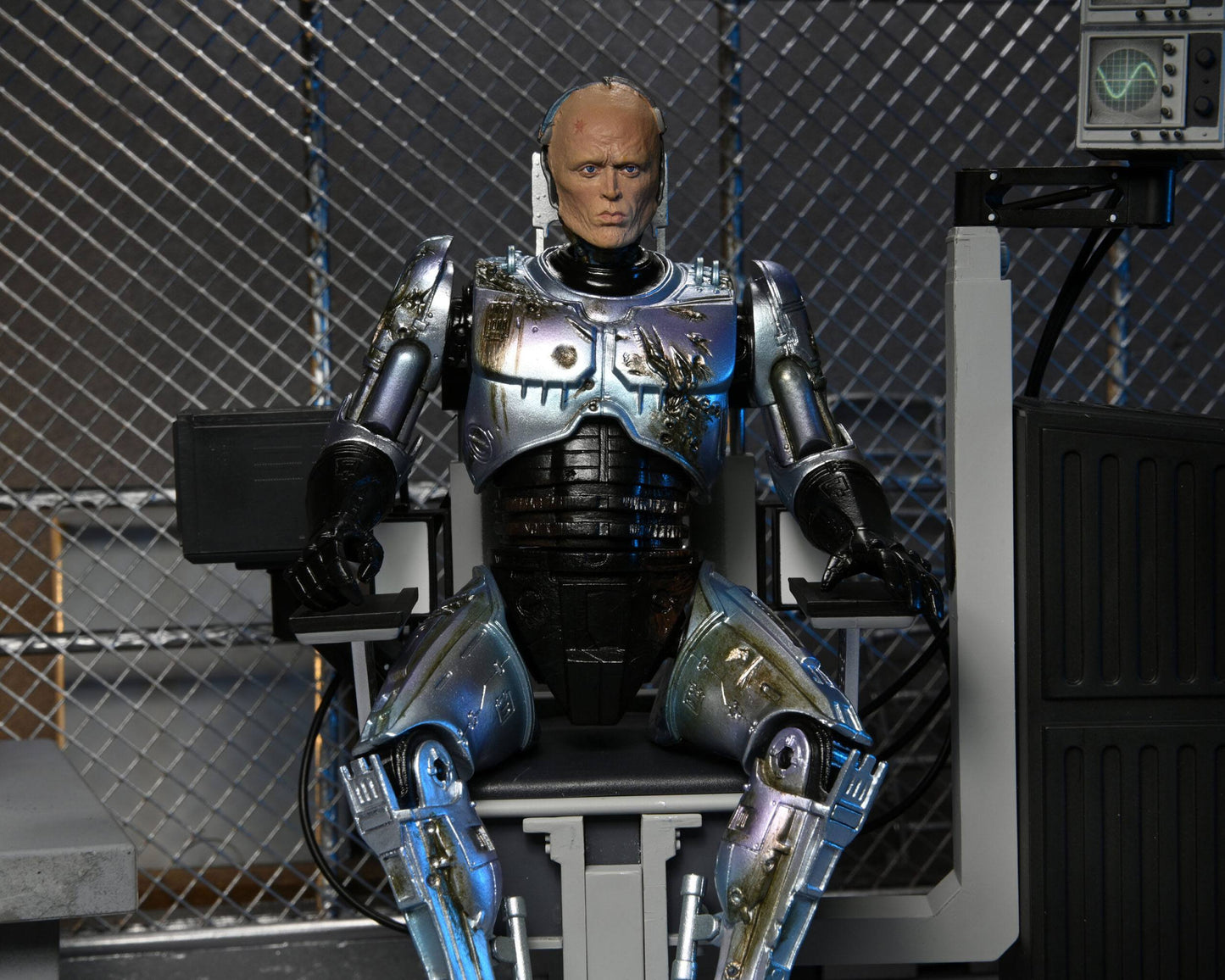 RoboCop figurine Ultimate Battle Damaged RoboCop with Chair 18 cm Neca