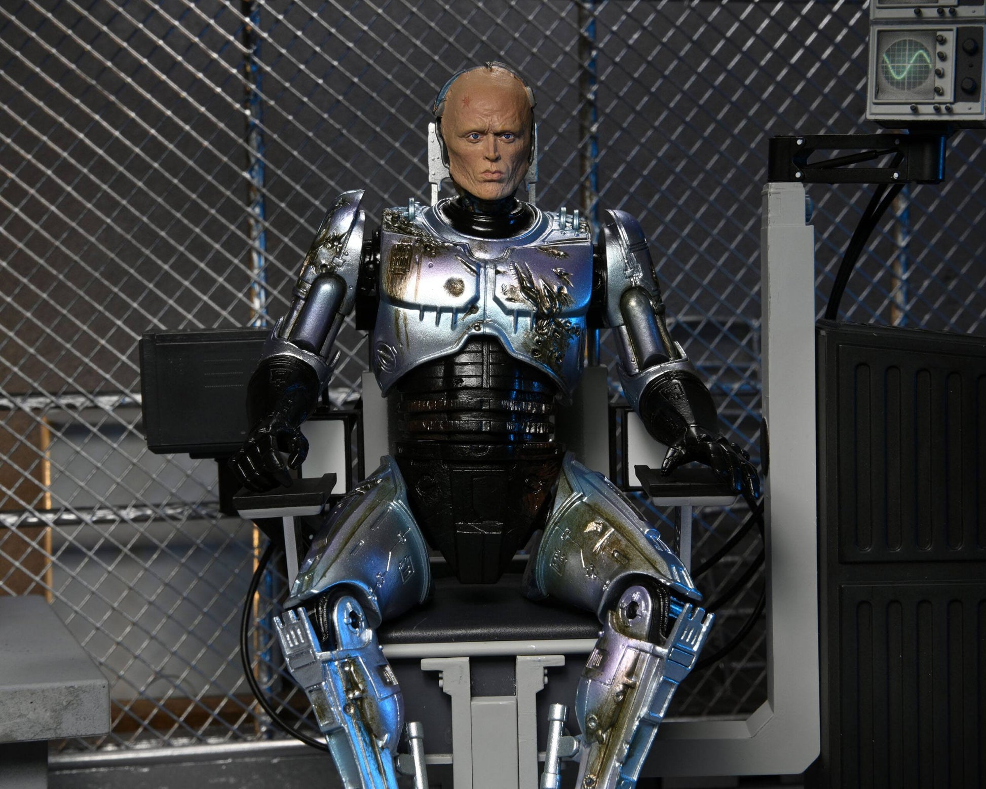 RoboCop figurine Ultimate Battle Damaged RoboCop with Chair 18 cm Neca